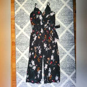 Black floral jumpsuit, size Medium